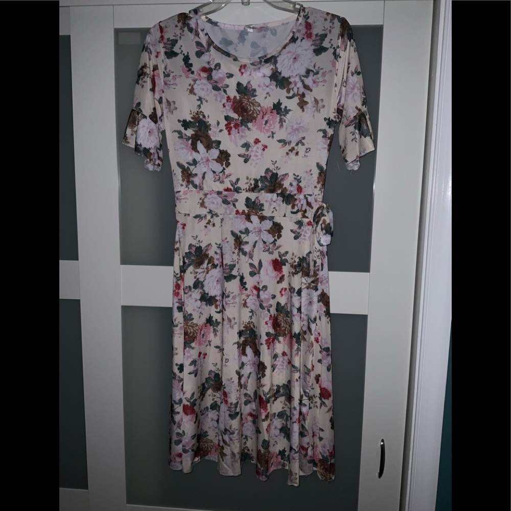 Woman’s floral dress ( Never Worn )
